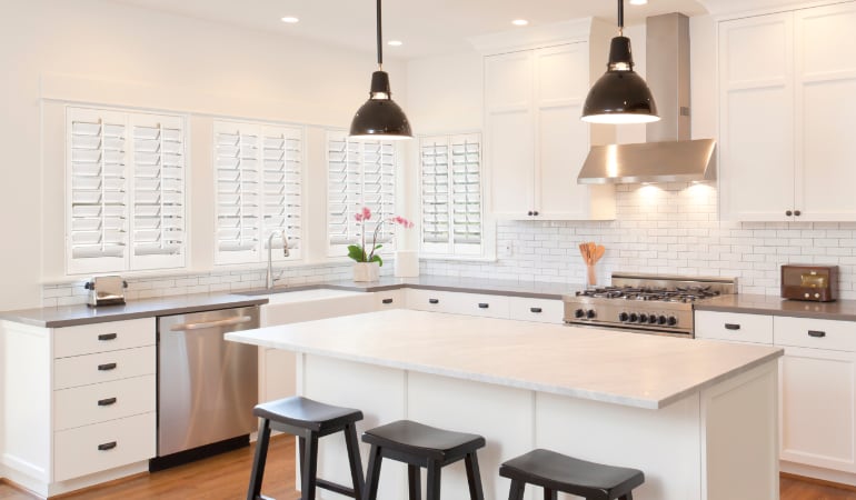 Plantation shutters in a bright San Diego kitchen.